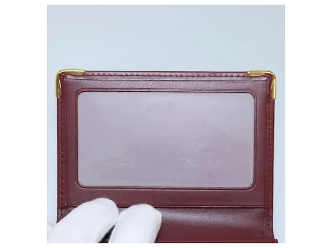 Estuche para tarjetas CARTIER de cuero rojo vino Auth 78617 Burdeos 