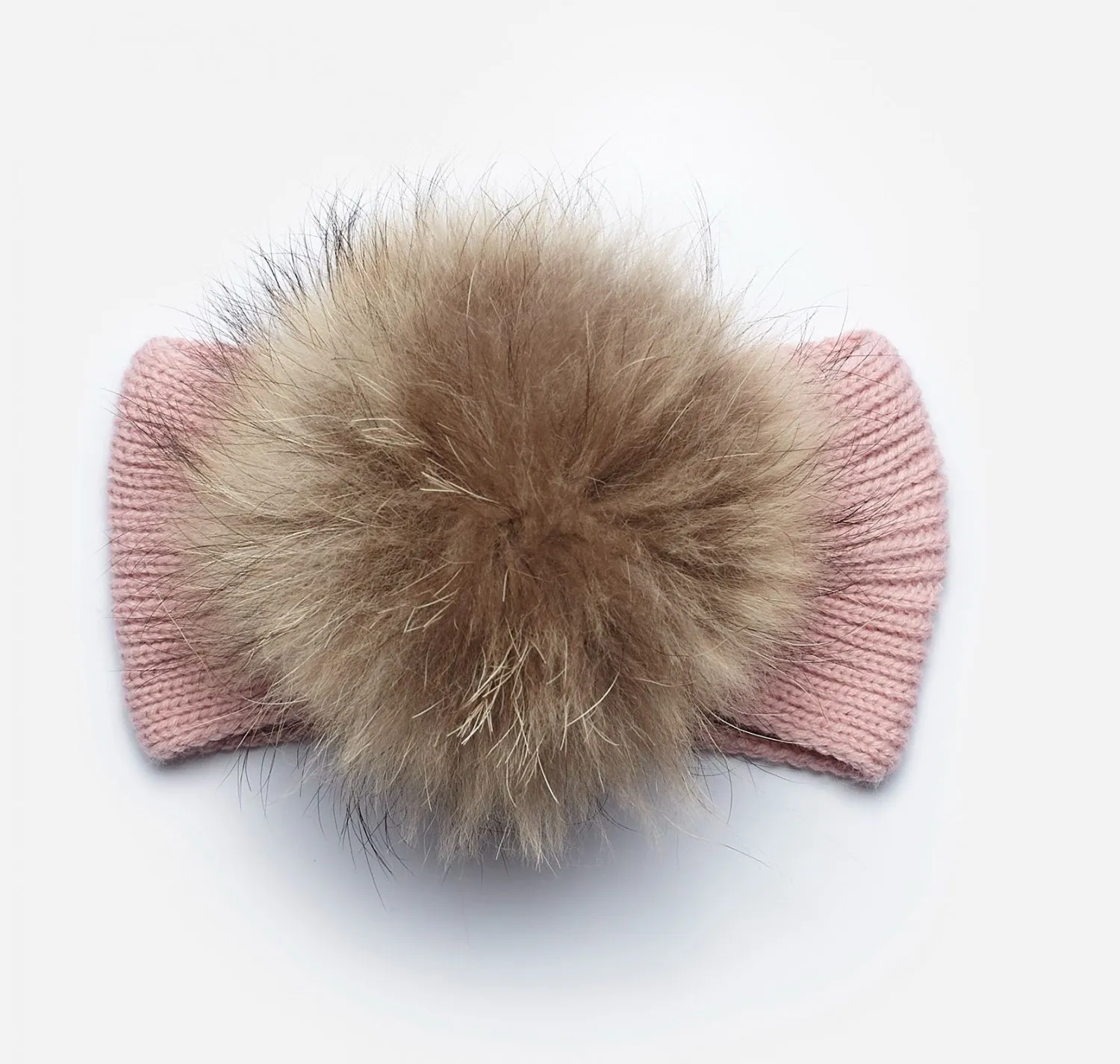 Knitted turban with fur pompom. two shades of pink